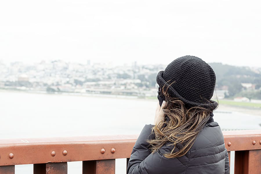 Woman sightseer in San Francisco during winter