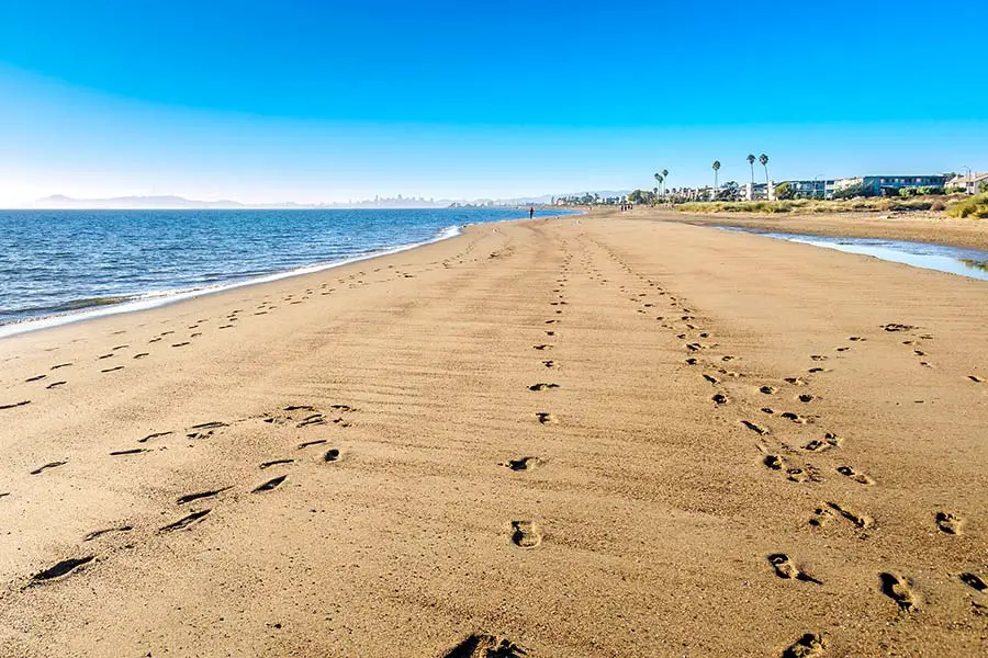 Sandy beach with footprints