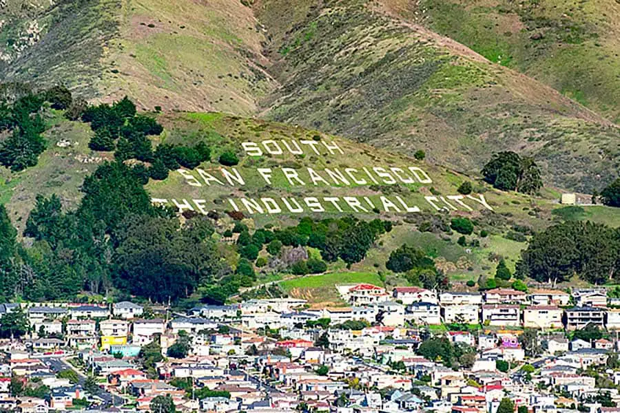 South San Francisco, The Industrial City wrote on the hillside with houses in foreground