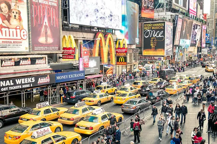 Yellow taxis on street in Times Square