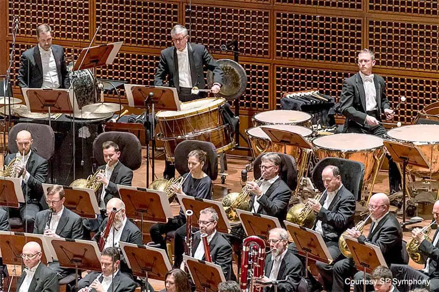 Members of the symphony, including percussion, brass and wind sections