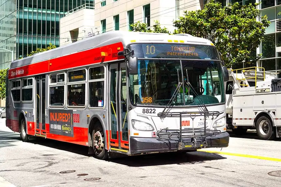 Muni bus taking passengers to their destination