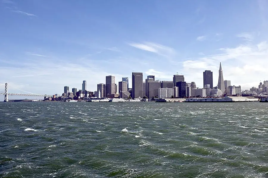 Choppy water in bay, San Francisco skyline on horizon