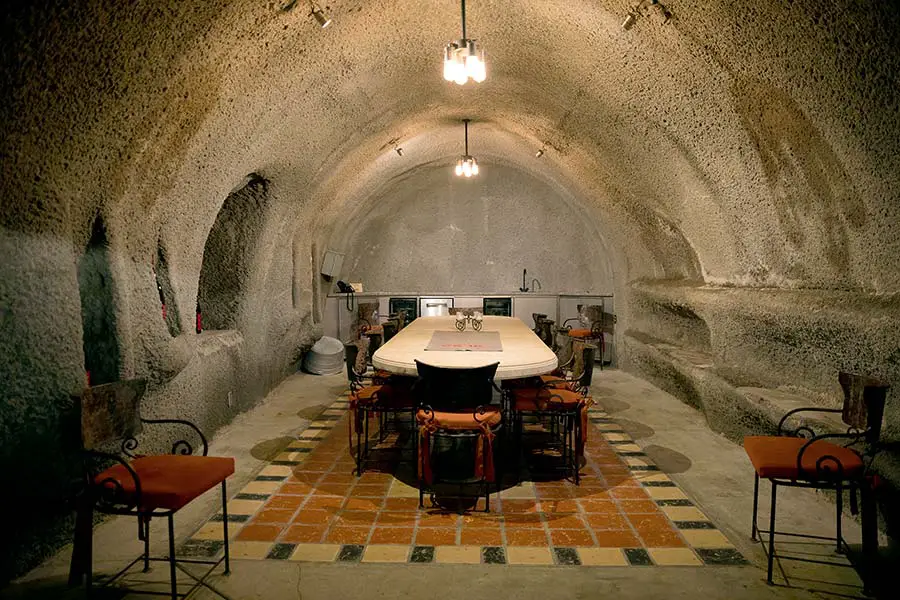 Wine tasting table in underground wine cellar