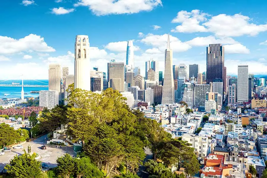 210 foot tall Coit Tower, San Francisco skyline in background