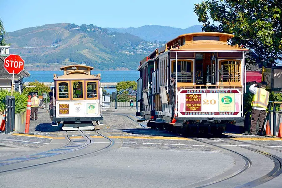 Two cable cars taking passengers to their destination