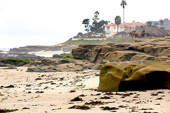 Large rocks and sandy beach